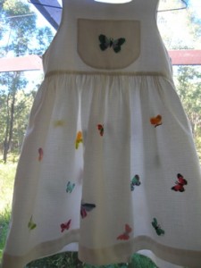 Cross-stitched butterfly pinafore