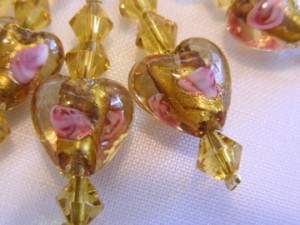 Gold foiled glass bead stitch markers