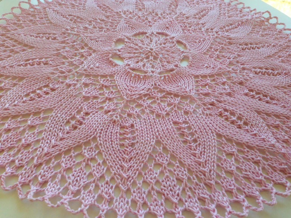 Hand knitted pink cotton doily